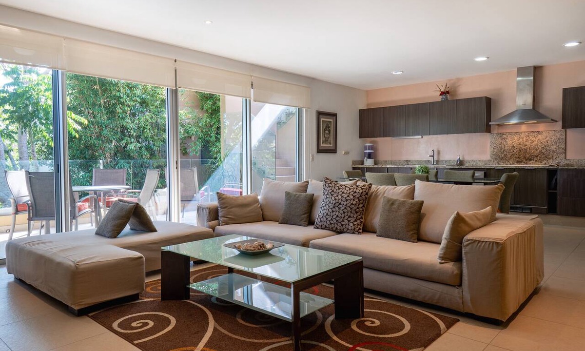Playacar Fase II Condo | 4 Pools and Budget Penthouse in Vaiven. From BRIC Vacation Rentals