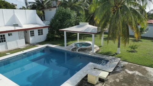 Tecolutla House | Alojamiento con alberca privada y jardín grande