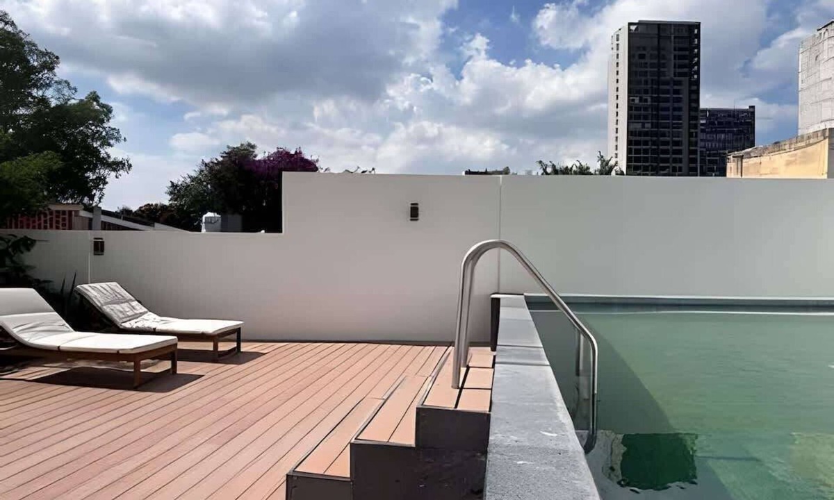 Providencia Apartment | Balcony skyline views - pool, gym & parking