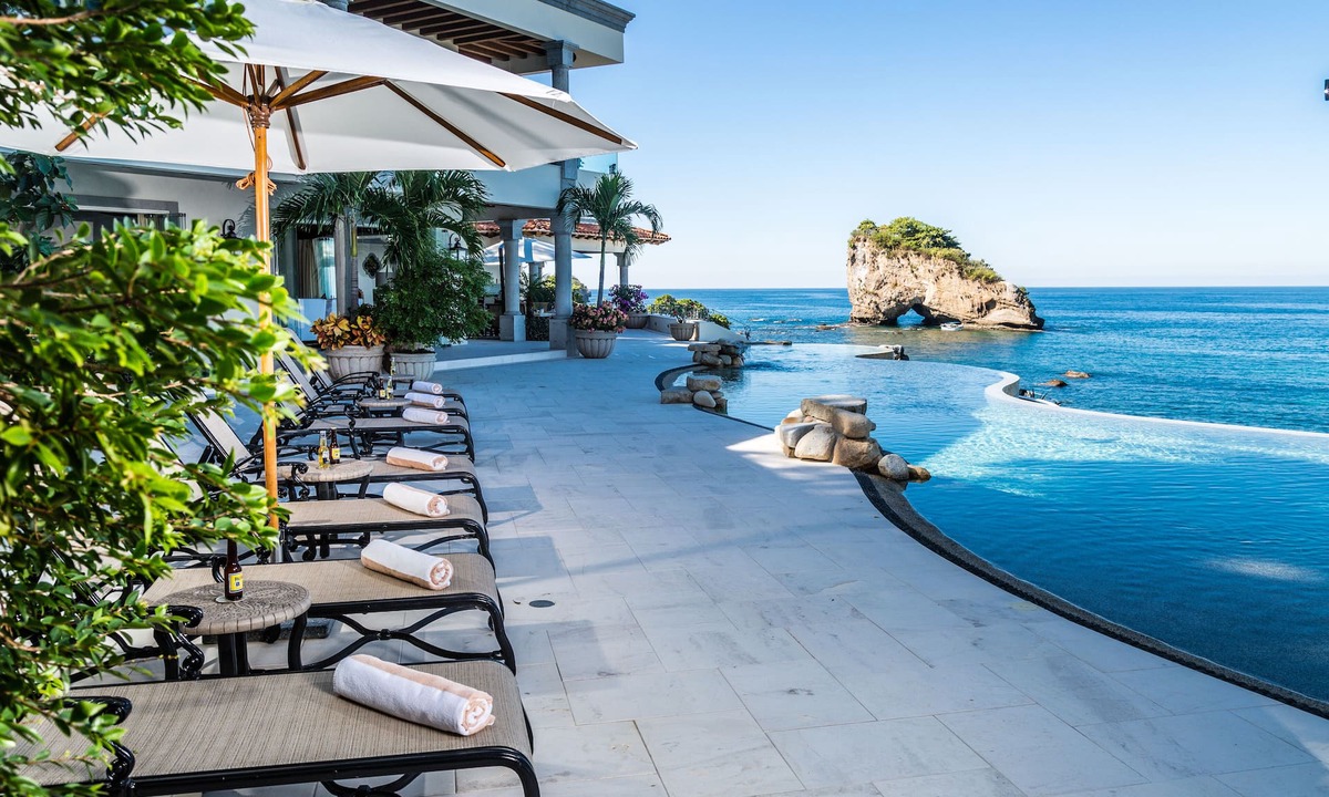 Puerto Vallarta Villa | Beachfront Estate with sunset views over the famous Los Arcos of Puerto Vallarta