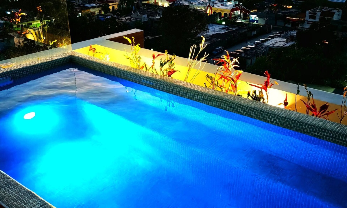 Colonia Centro Condo | Brand New Build - best Location 2 blocks from the fery ocean view Pool Roof Top.