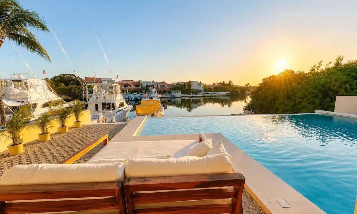 Puerto Aventuras Condo | Canal view, pool, 7-min walk to beach