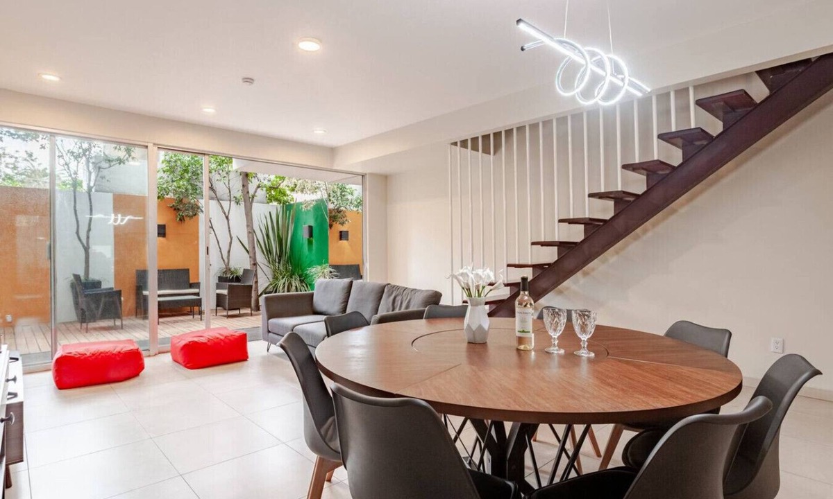 Roma Sur Apartment | Escape to an exclusive duplex with wine and terrace
