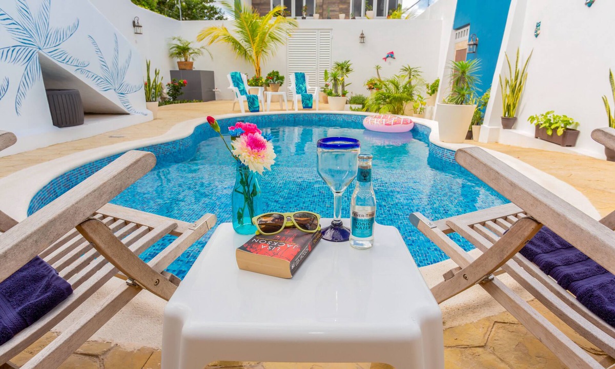 Colonia Centro Villa | HGTV-Featured Coastal Retreat Walk to the Sea Perfect for Divers