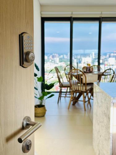 Financial District Apartment | Modern 2BR Condo in Providencia, City Views, Pool & Gym