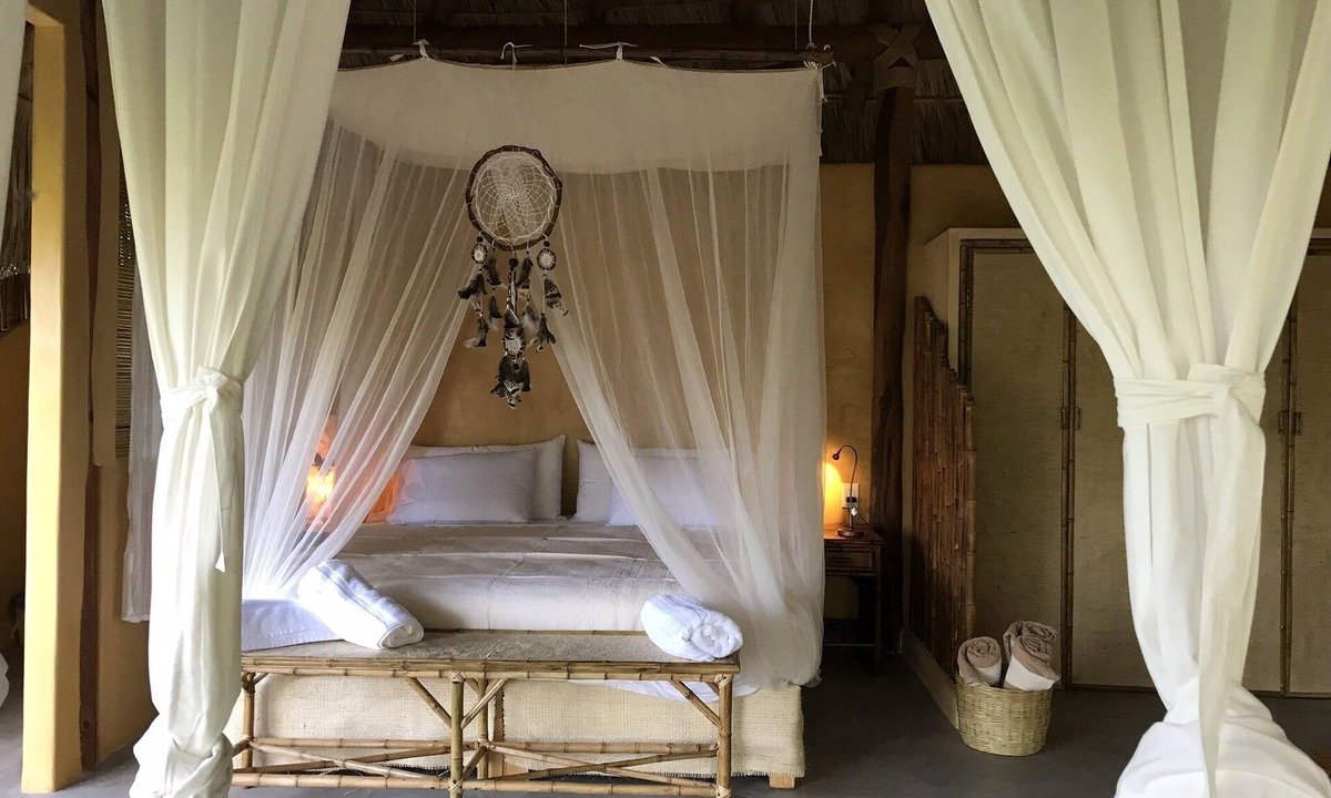 Zihuatanejo House | Romantic bungalow surrounded by trees.