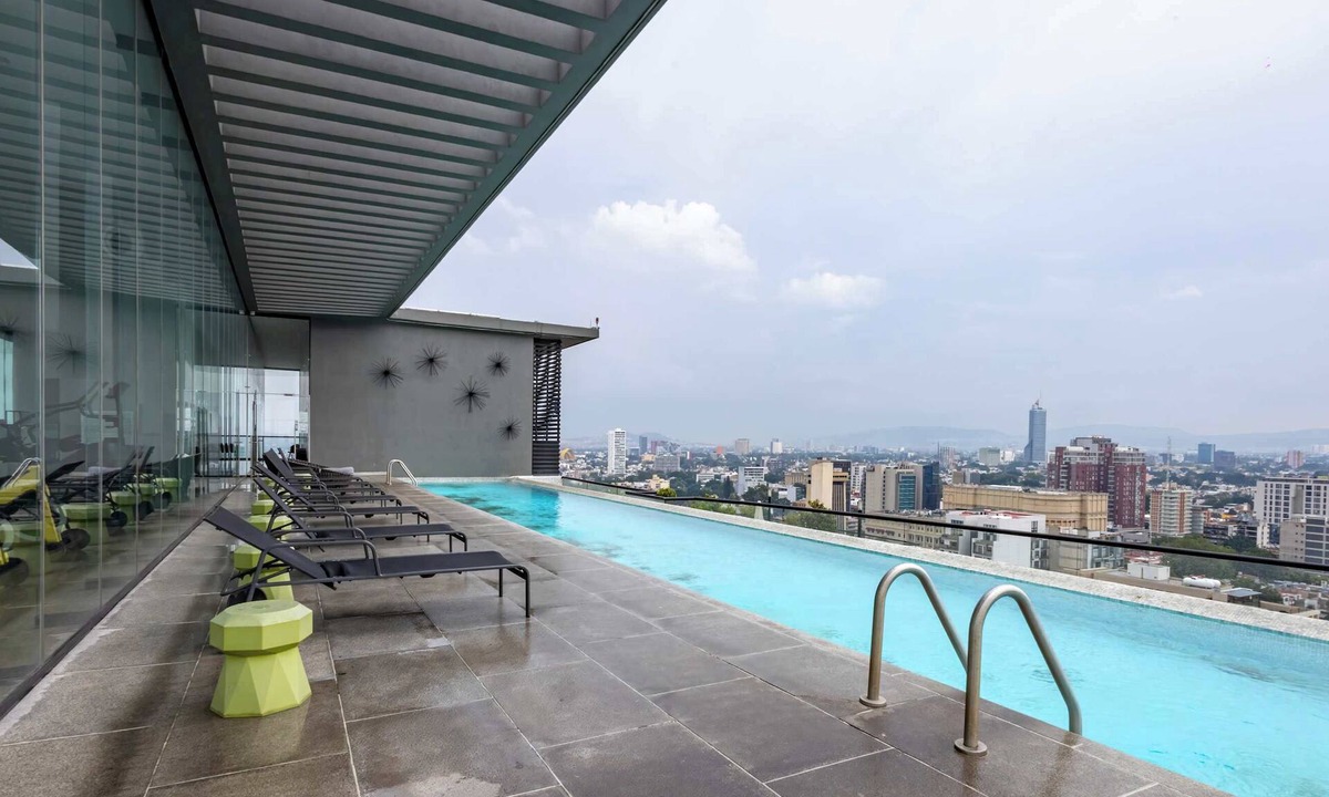 Zona Minerva Apartment | Skyline View Patio & Pool Access in Jalisco