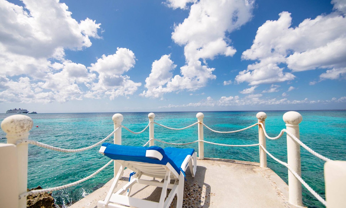 San Miguel Condo | Stunning Decorated Condo Rare Ocean Setting Snorkling paradise walk to town best