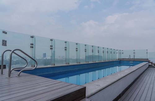 Ampliacion Granada Condo | 1BR|1BA Apartment W/pool, gym, high speed WiFi, located just a 3-minute walk from the new U.S. Embassy