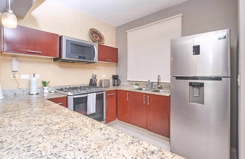 Zazil-ha Apartment | 2BR condo - pool, BBQ & beach steps away