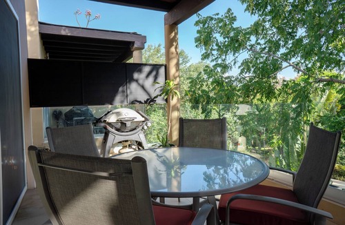 Playacar Fase II Condo | 4 Pools and Budget Penthouse in Vaiven. From BRIC Vacation Rentals