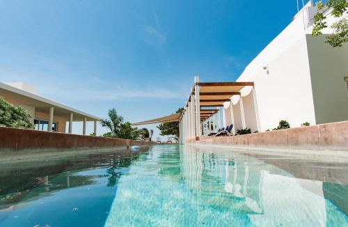 Chicxulub Puerto House | 97985 Stunning beachfront Suites Wi-Fi East of Progreso