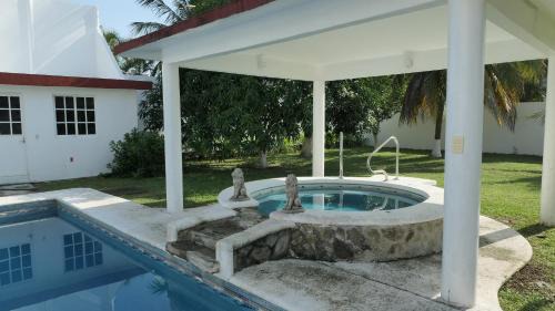 Tecolutla House | Alojamiento con alberca privada y jardín grande