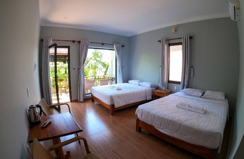 Cua Lap Hotel | Areca Garden Bungalow