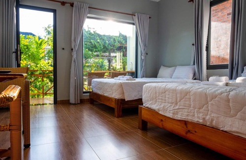Cua Lap Hotel | Areca Garden Bungalow
