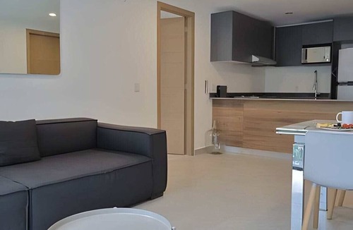 Providencia Apartment | Balcony skyline views - pool, gym & parking