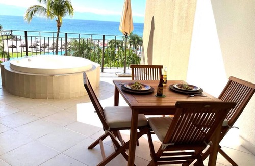 South Hotel Zone Condo | Beachfront 1 br. condo with private hot tub at Gran Venetian Puerto Vallarta