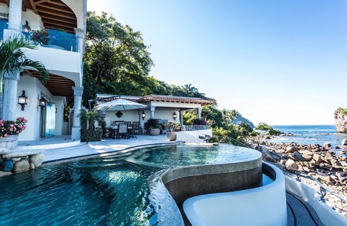 Puerto Vallarta Villa | Beachfront Estate with sunset views over the famous Los Arcos of Puerto Vallarta
