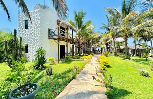 Elota Apartment | Beautiful sunsets on the beach By PartnerHost