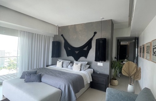 North Hotel Zone Apartment | Boho Chic Beachfront Condo with Beautiful Ocean and City Views!