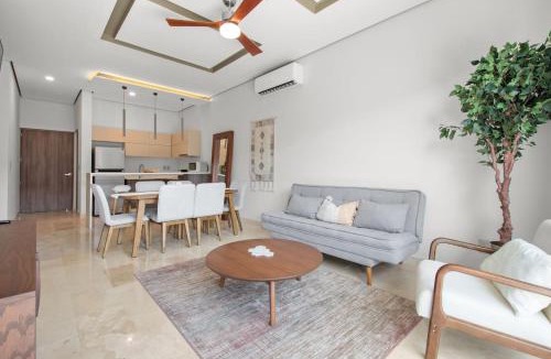 Playa Paraiso Apartment | Bright 2BR Amira District Gem with Shared Pool
