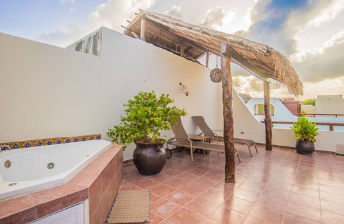 Gonzalo Guerrero Condo | Budget Penthouse. Walking Distance to Beach and Stores by BRIC Vacation Rentals