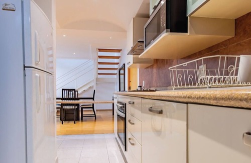 El Yaqui Condo | Capitalia - Bright & Modern Duplex