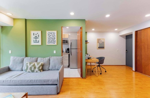 Anahuac Condo | Capitalia | Bright balcony + Bike & Leafy Views