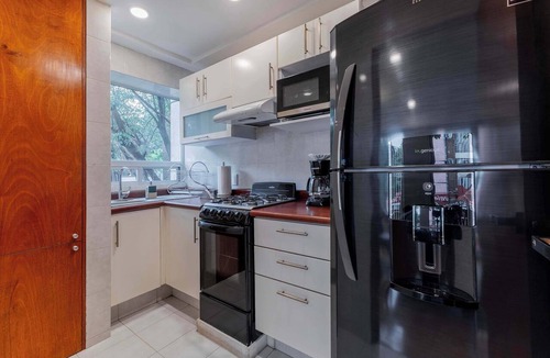 Anahuac Condo | Capitalia | Remote-Work Ready | Gym & Pet Friendly