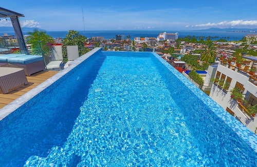 Colonia 5 de Diciembre House | Casa Isacamil - Impeccable Views, Contemporary, Rooftop Pool, Proximity to Town