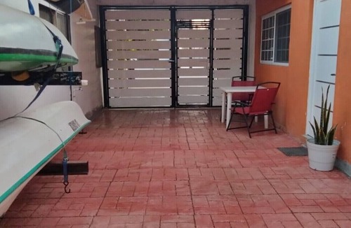 Puerto San Carlos Apartment | Casa Tamarindo, Queen size bed, Fully equipped kitchen, Downtown area