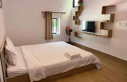 Tan Hiep House | Chàm Corner Lookout Homestay