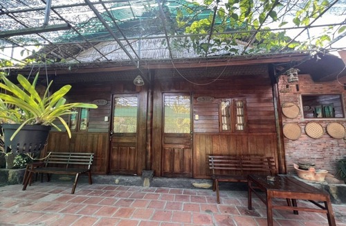 Long Ho House | CocoHome builted from 4000 coconut trunks -certificated as Vietnam Coconut House