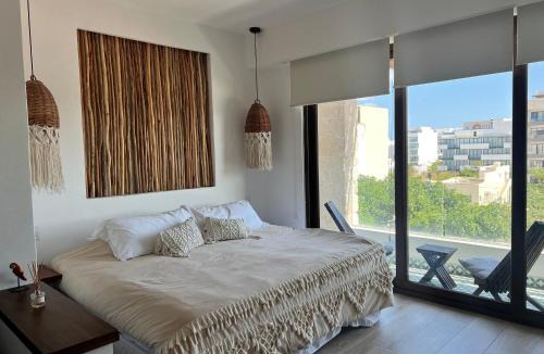 Luis Donaldo Colosio Apartment | Condo Boho con Roof pool y vista al mar