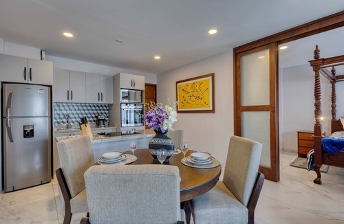 Downtown Cabo San Lucas Apartment | Dog-friendly apartment with rooftop infinity pool, gym, central AC, & balcony
