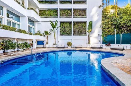 Conchas Chinas House | Elegant suite with ocean-view pools, hot tub, gym, balcony & full kitchen