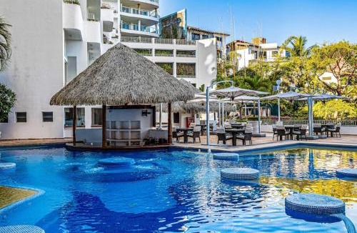 Conchas Chinas House | Elegant suite with ocean-view pools, hot tub, gym, balcony & full kitchen
