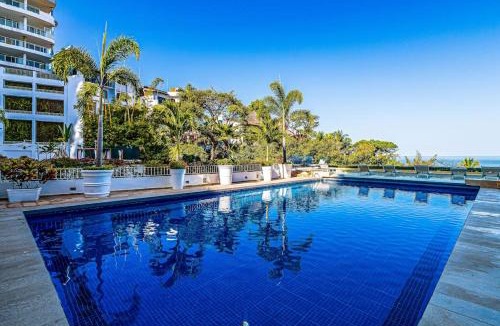 Conchas Chinas House | Elegant suite with ocean-view pools, hot tub, gym, balcony & full kitchen