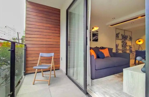 Colonia Roma Apartment | Embrace the Now: 203 Industrial's Sunlit Serenity Awaits