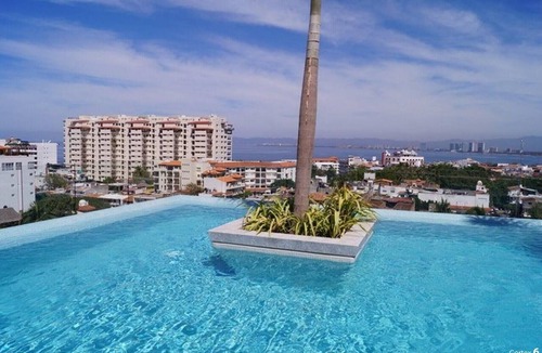 Emiliano Zapata Condo | Enjoy beach, pool and jacuzzi in Romantic Zone