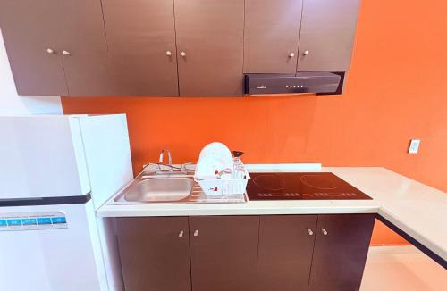 Ejidal Apartment | Estudio de Lujo con Cama King y vista con alberca