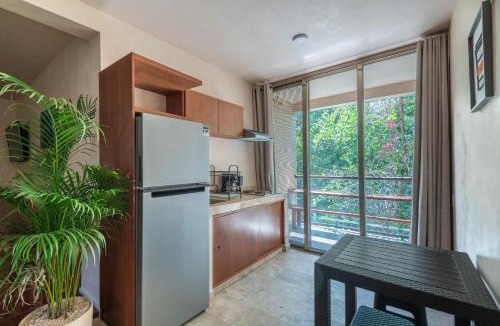 Chemuyil Apartment | Family Studio Suite with Kitchenette & Terrace - Santuario Hotel Boutique