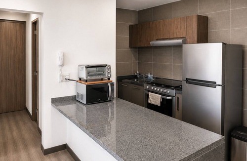 Anahuac Apartment | Major international sporting event high speed WiFi , minimalist chic decor, with all the amenities