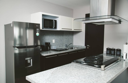 Ampliacion Granada Apartment | Fully equipped kitchen, high speed internet, comfy king-size bed and a sofa bed.