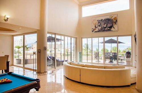 Flamingos Villa | Gorgeous Two-Story Penthouse Private Community on the Beach!