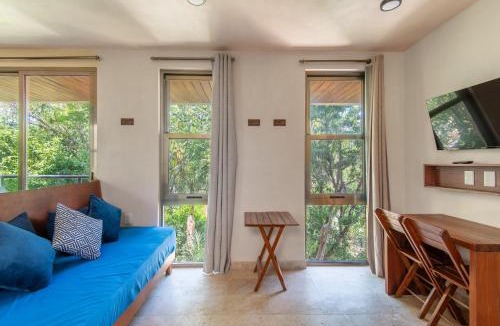 Chemuyil Apartment | Jungle Loft Suite with Terrace & Natural Light - Santuario Hotel Boutique