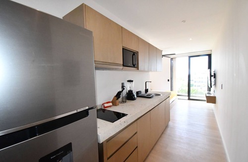 Luis Donaldo Colosio Apartment | Kumaru Suites by The Spot Rentals