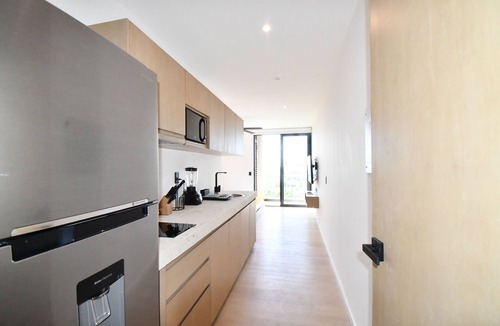 Luis Donaldo Colosio Apartment | Kumaru Suites by The Spot Rentals