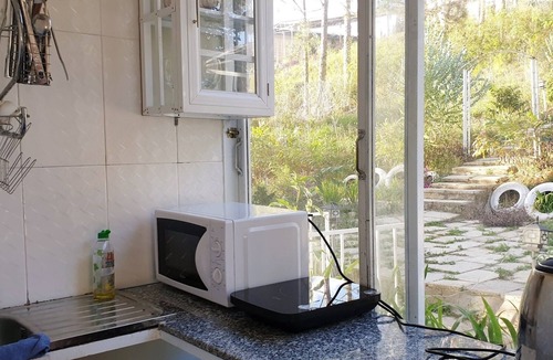 Da Lat House | Lovely Treehouse with 2 queen beds, restroom, small kitchen, balcony forest view