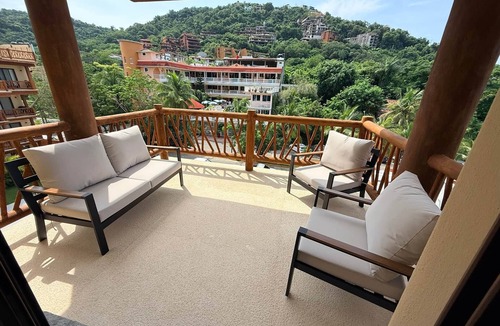 Zihuatanejo Villa | Luxurious 2 bedroom condo Steps from Beach with ocean view from balcony.